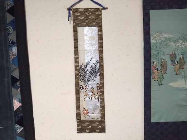 戦場で争うタペストリー